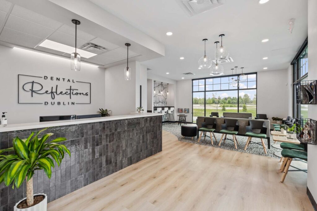 interior lobby with chairs, tables, and big windows