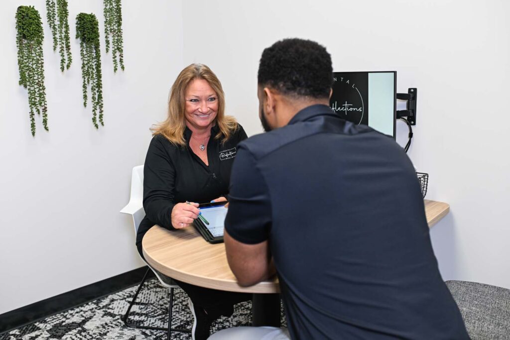 Karen breaking down finances with a patient